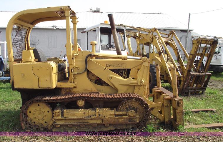 image for item 5431 Dresser 100C track loader with forks