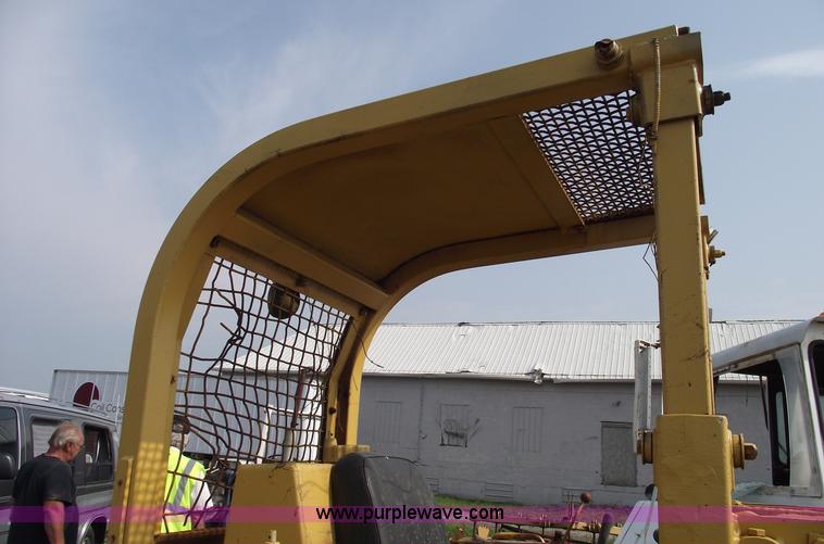 image for item 5431 Dresser 100C track loader with forks