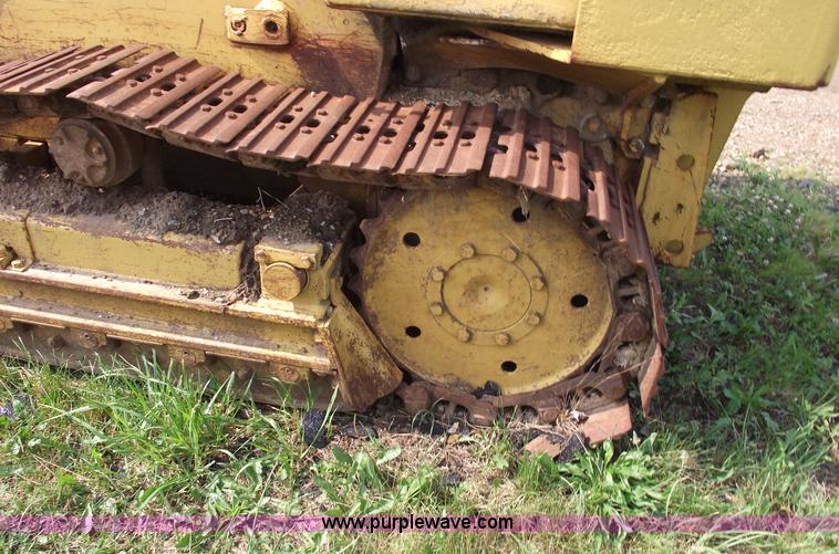 image for item 5431 Dresser 100C track loader with forks