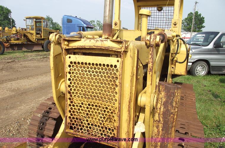 image for item 5431 Dresser 100C track loader with forks