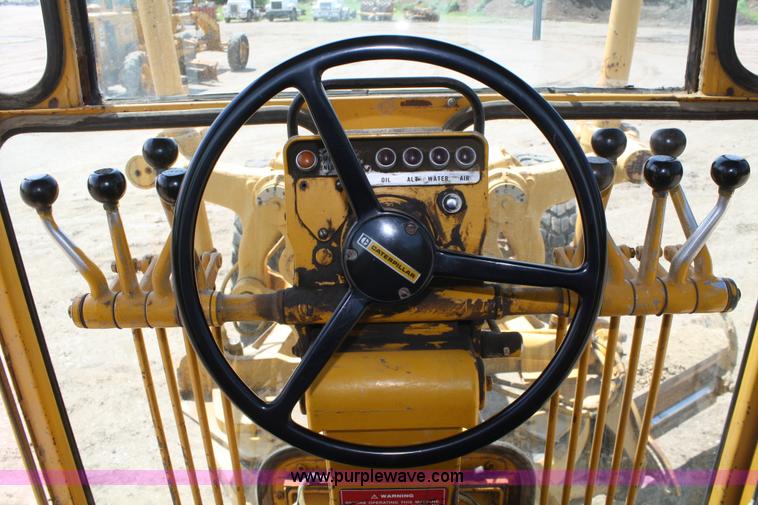 image for item A2005 1976 Caterpillar 140G articulating motor grader