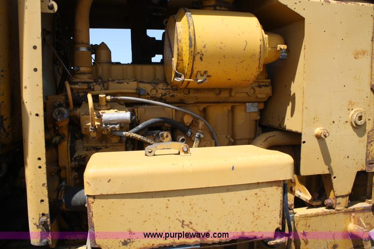 image for item A2005 1976 Caterpillar 140G articulating motor grader