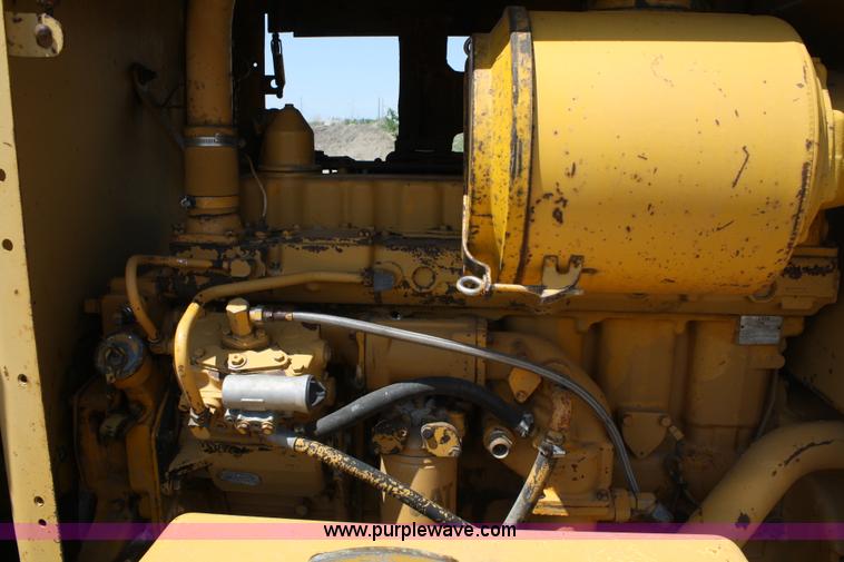 image for item A2005 1976 Caterpillar 140G articulating motor grader