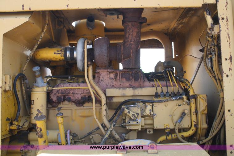 image for item A2005 1976 Caterpillar 140G articulating motor grader