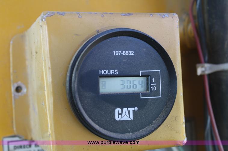 image for item A2006 1977 Caterpillar 140G articulating motor grader