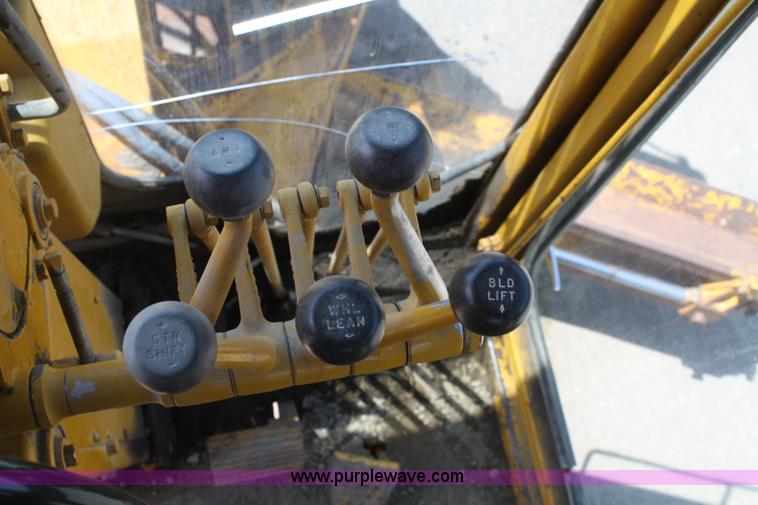 image for item A2006 1977 Caterpillar 140G articulating motor grader