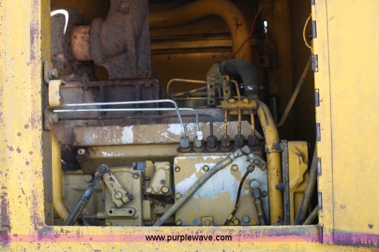 image for item A2006 1977 Caterpillar 140G articulating motor grader