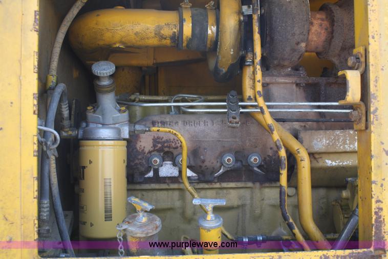 image for item A2006 1977 Caterpillar 140G articulating motor grader