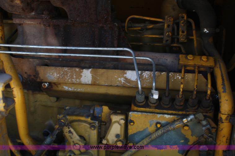 image for item A2006 1977 Caterpillar 140G articulating motor grader