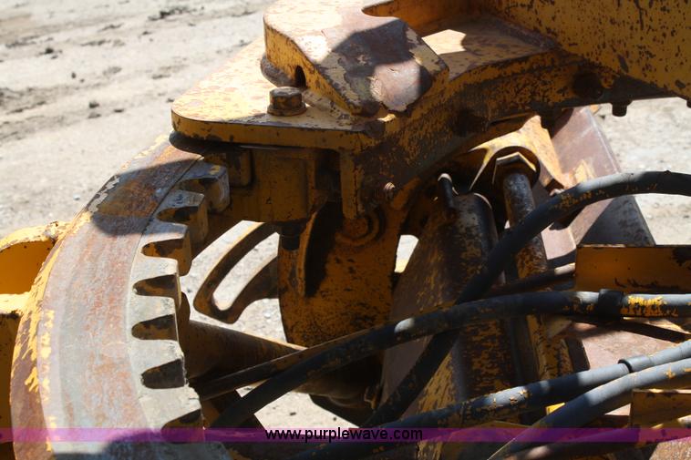 image for item A2006 1977 Caterpillar 140G articulating motor grader