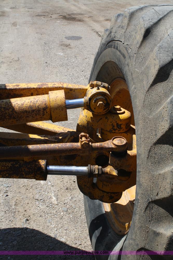 image for item A2006 1977 Caterpillar 140G articulating motor grader