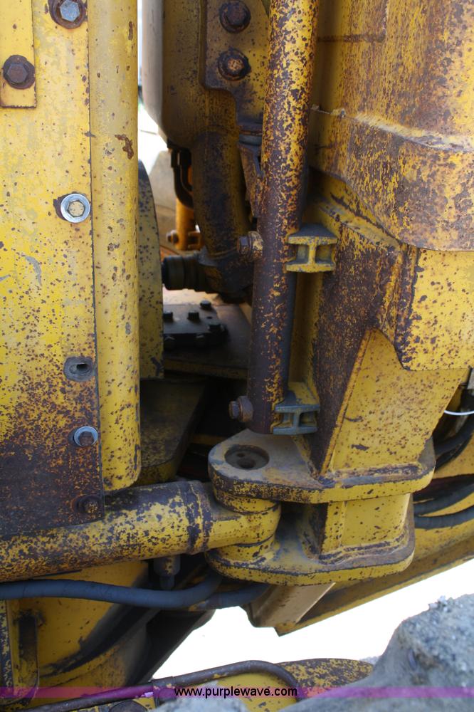 image for item A2006 1977 Caterpillar 140G articulating motor grader