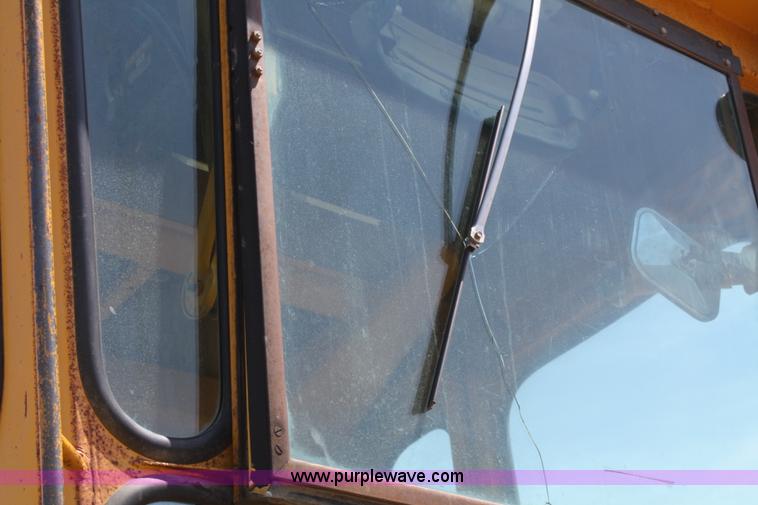 image for item A2006 1977 Caterpillar 140G articulating motor grader