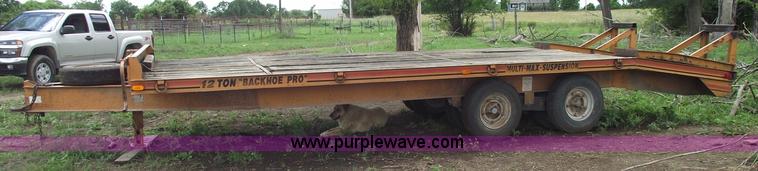 image for item A4241 1992 Econoline P243D 12 ton Backhoe Pro trailer