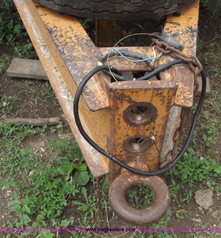 image for item A4241 1992 Econoline P243D 12 ton Backhoe Pro trailer