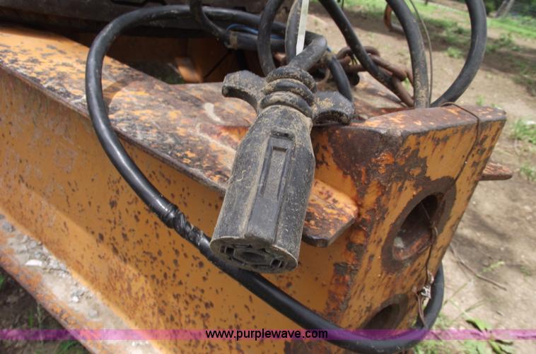 image for item A4241 1992 Econoline P243D 12 ton Backhoe Pro trailer