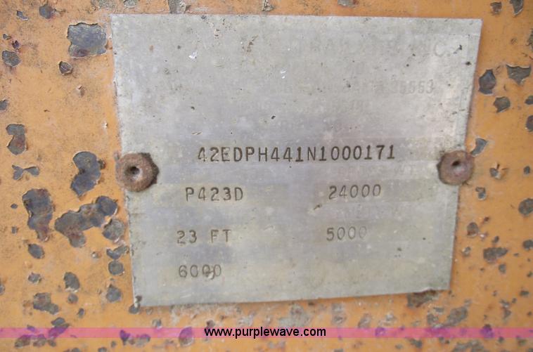 image for item A4241 1992 Econoline P243D 12 ton Backhoe Pro trailer