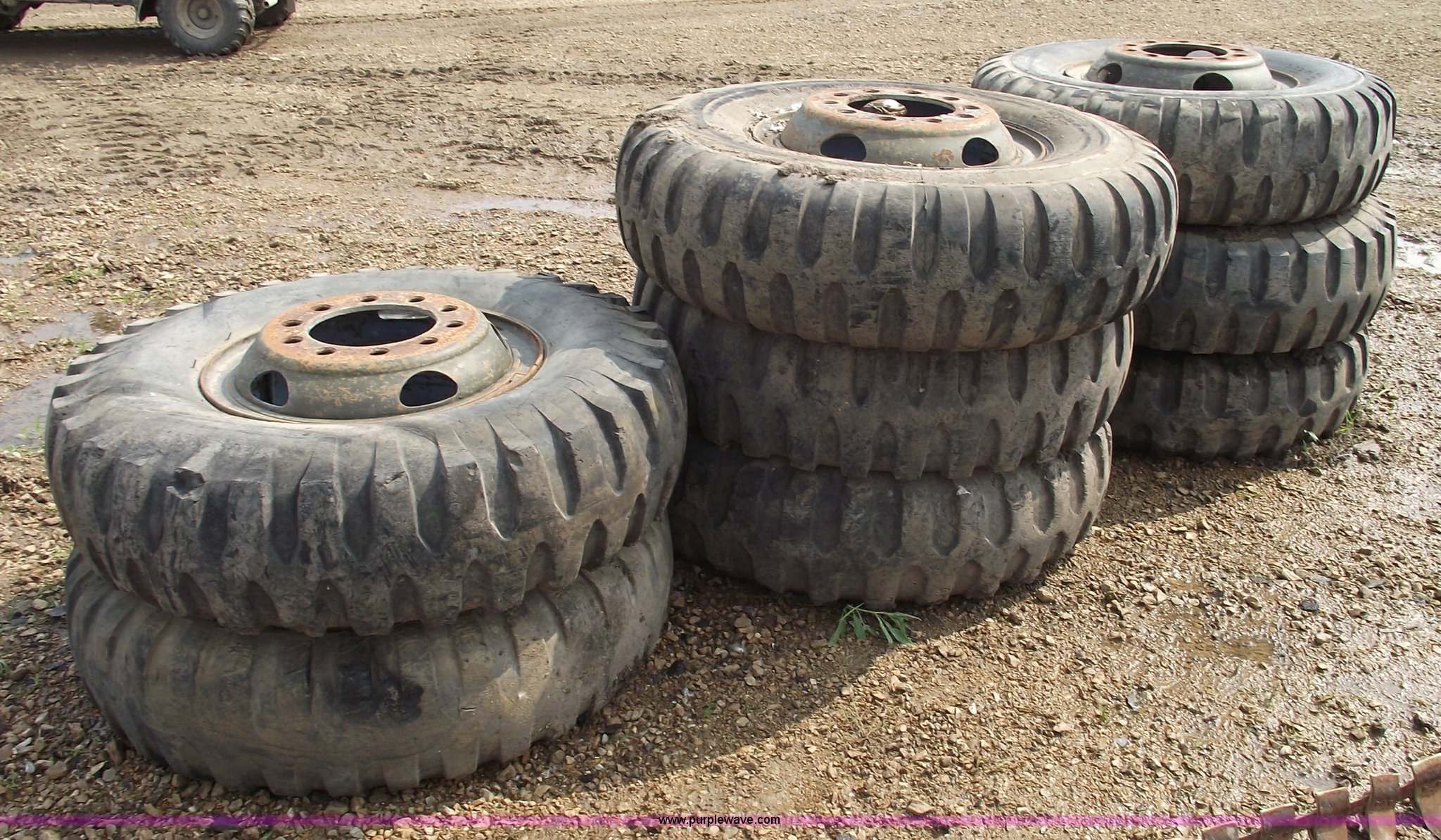 (8) 12.0020 military tires and wheels in Sedalia, MO Item 5430 sold