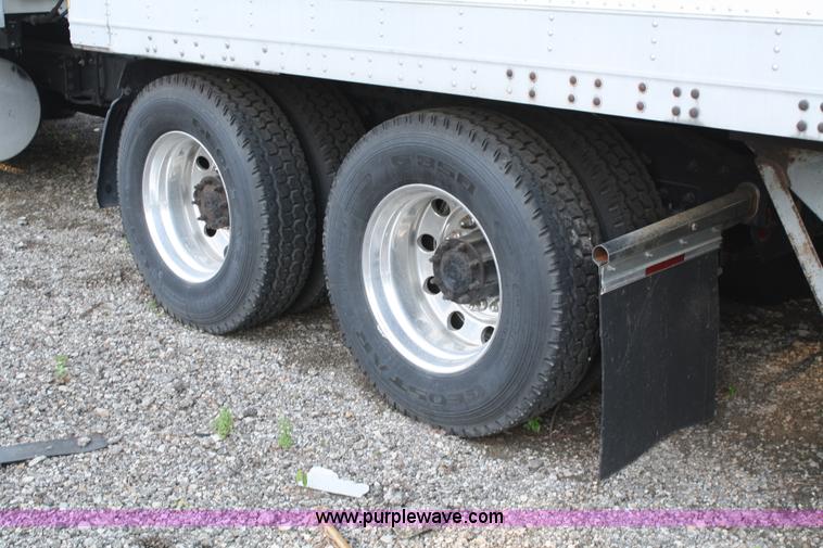 image for item A2050 1999 Freightliner FLC120 semi truck