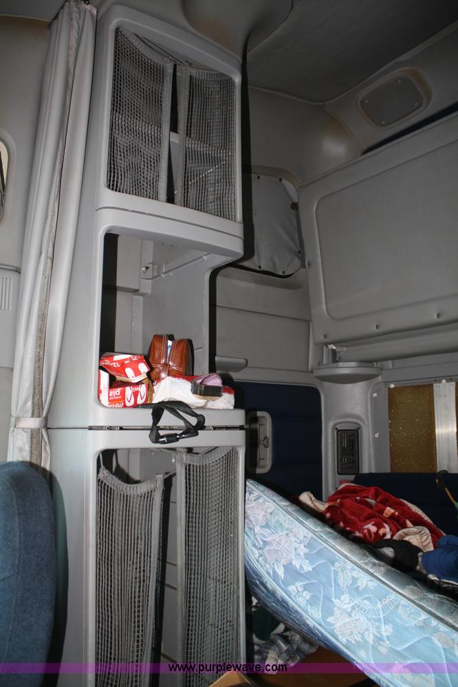 image for item A2050 1999 Freightliner FLC120 semi truck