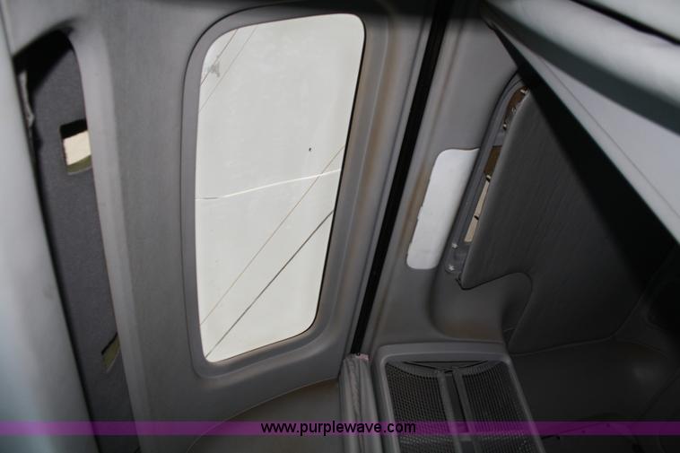 image for item A2050 1999 Freightliner FLC120 semi truck