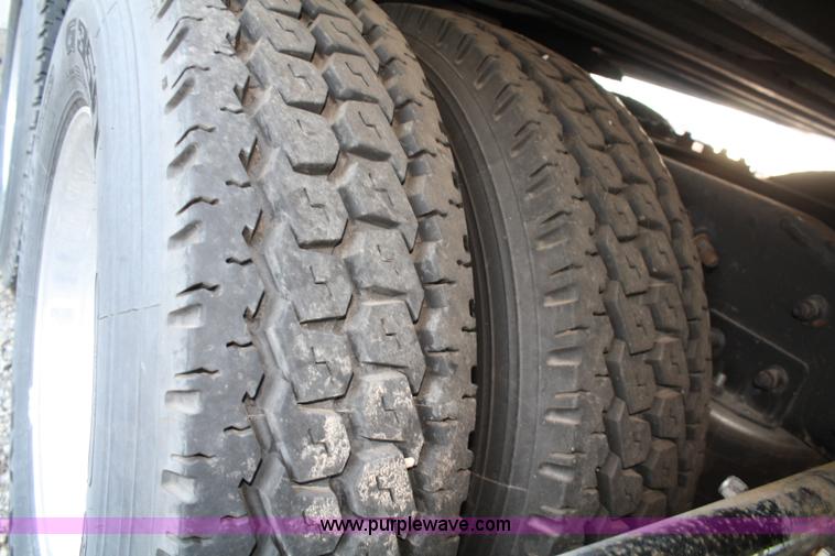 image for item A2050 1999 Freightliner FLC120 semi truck