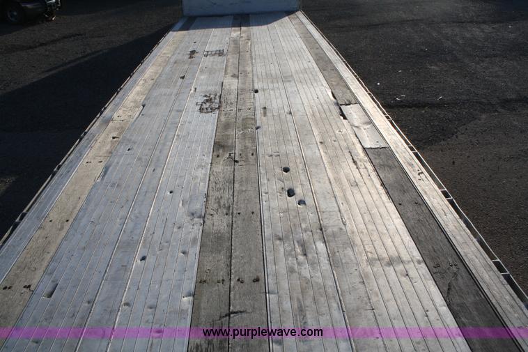 image for item A2057 1999 Ravens 48' aluminum drop deck trailer