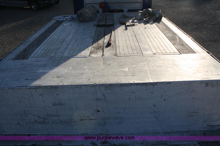 image for item A2057 1999 Ravens 48' aluminum drop deck trailer