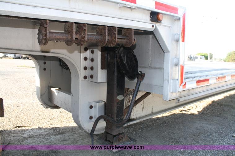 image for item A2057 1999 Ravens 48' aluminum drop deck trailer