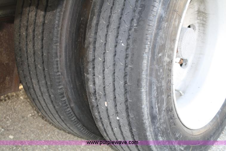 image for item A2057 1999 Ravens 48' aluminum drop deck trailer