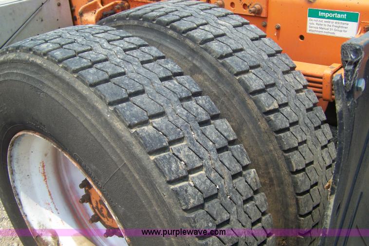 image for item 7350 1996 Freightliner FL70 semi truck