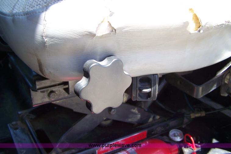 image for item 7398 2000 Freightliner FL70 flatbed semi truck