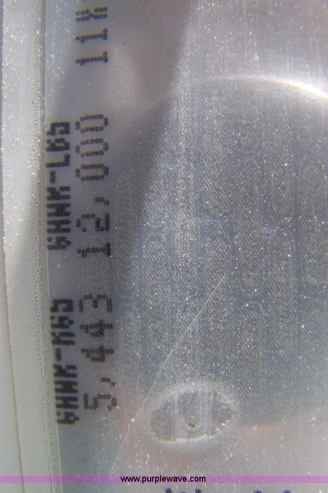 image for item 7398 2000 Freightliner FL70 flatbed semi truck