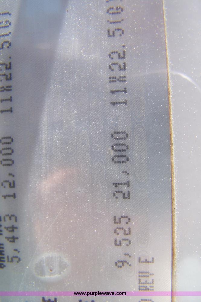 image for item 7398 2000 Freightliner FL70 flatbed semi truck