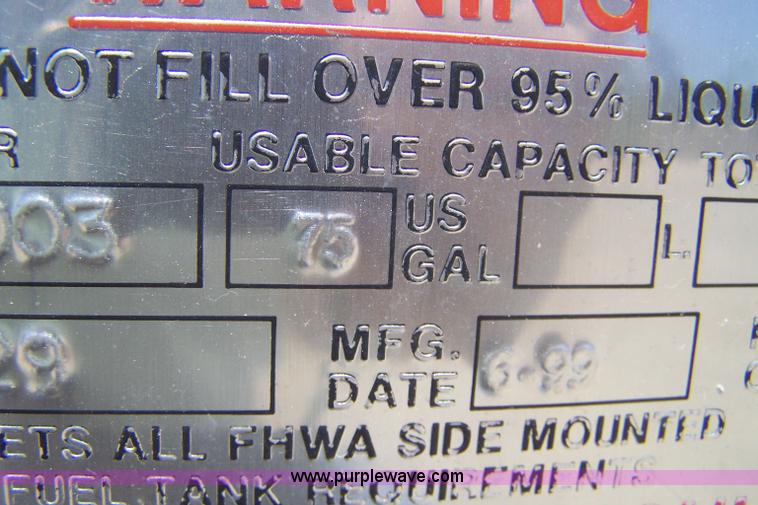 image for item 7398 2000 Freightliner FL70 flatbed semi truck