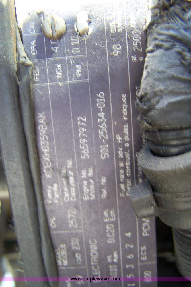 image for item 7398 2000 Freightliner FL70 flatbed semi truck