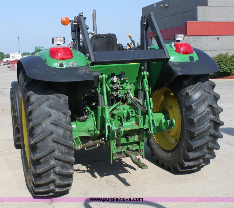 image for item A2009 2005 John Deere 6420 MFWD tractor with loader