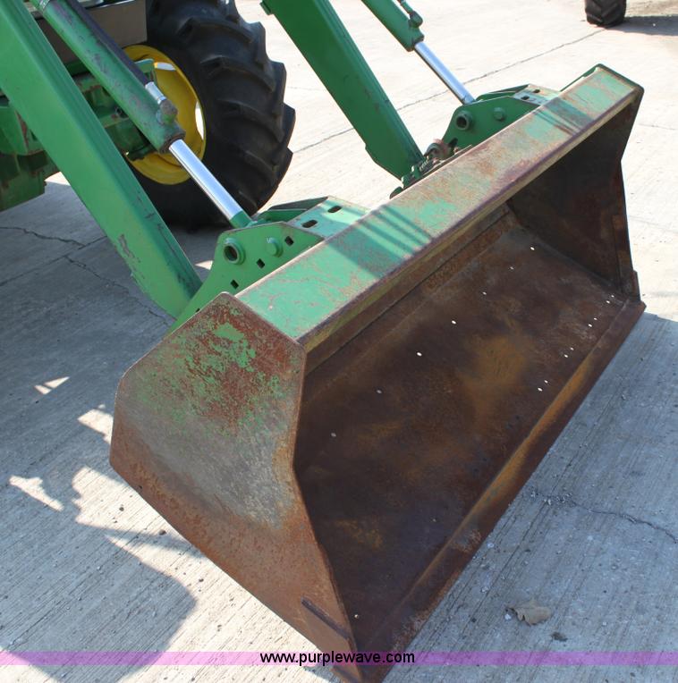 image for item A2009 2005 John Deere 6420 MFWD tractor with loader