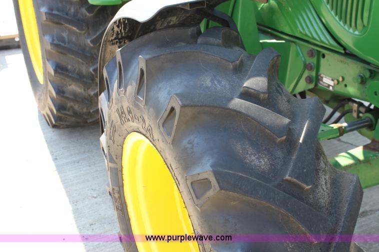 image for item A2009 2005 John Deere 6420 MFWD tractor with loader