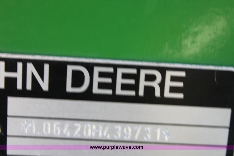 image for item A2009 2005 John Deere 6420 MFWD tractor with loader