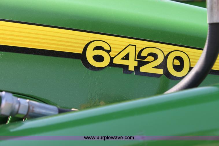 image for item A2009 2005 John Deere 6420 MFWD tractor with loader