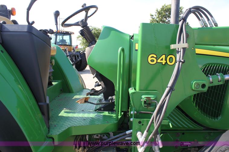 image for item A2009 2005 John Deere 6420 MFWD tractor with loader