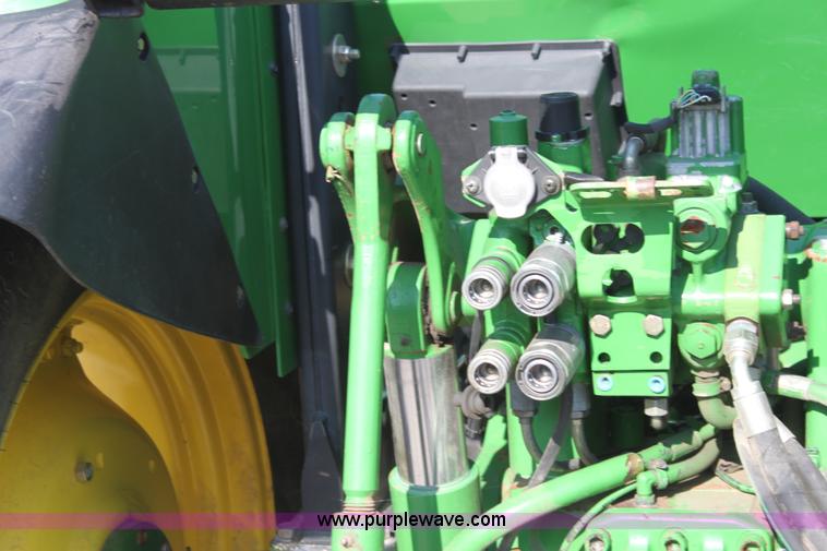 image for item A2009 2005 John Deere 6420 MFWD tractor with loader