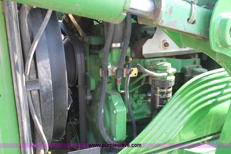 image for item A2009 2005 John Deere 6420 MFWD tractor with loader