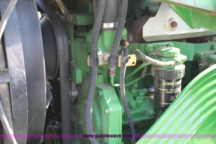 image for item A2009 2005 John Deere 6420 MFWD tractor with loader