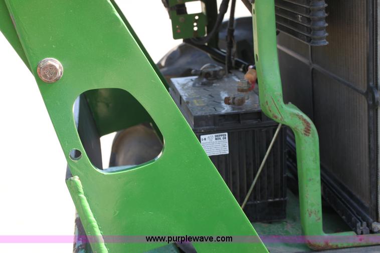 image for item A2009 2005 John Deere 6420 MFWD tractor with loader