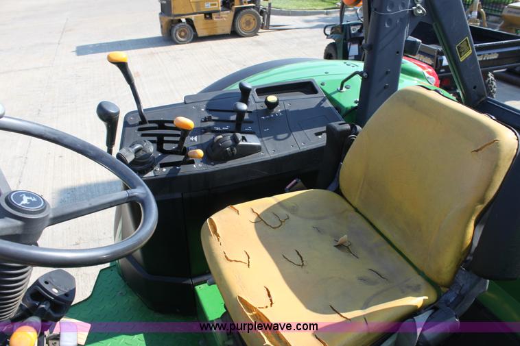 image for item A2009 2005 John Deere 6420 MFWD tractor with loader