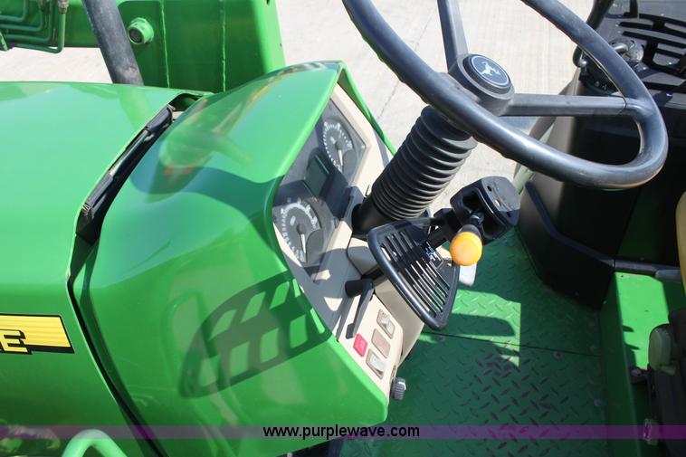 image for item A2009 2005 John Deere 6420 MFWD tractor with loader