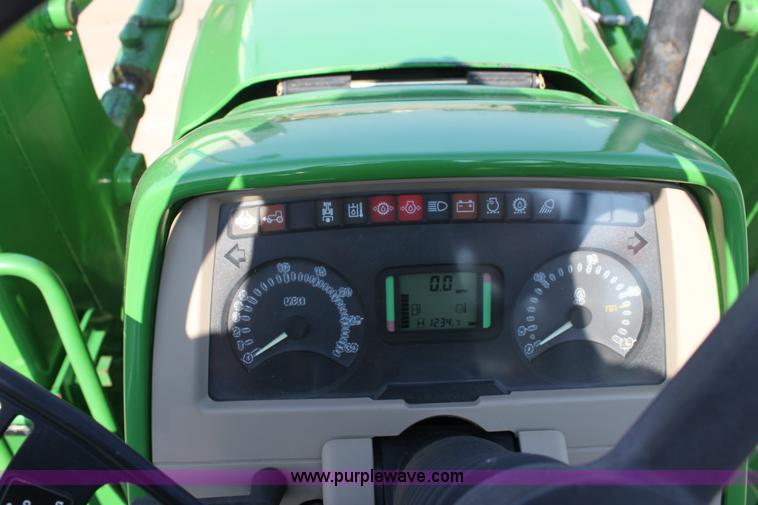 image for item A2009 2005 John Deere 6420 MFWD tractor with loader