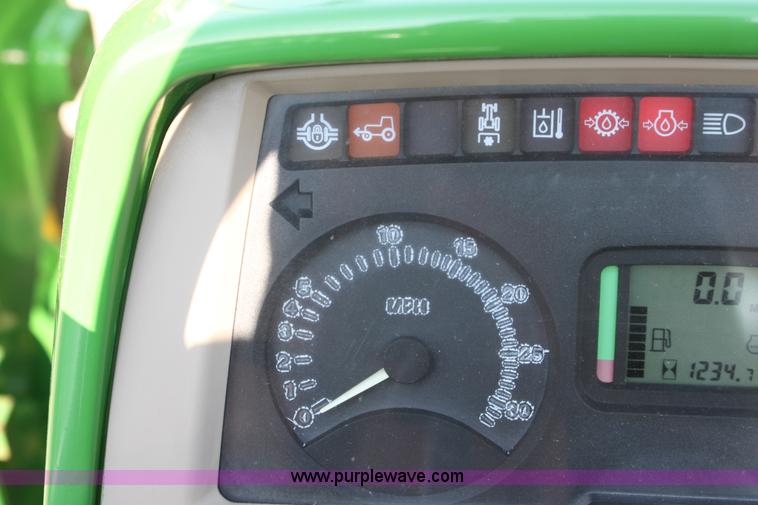 image for item A2009 2005 John Deere 6420 MFWD tractor with loader